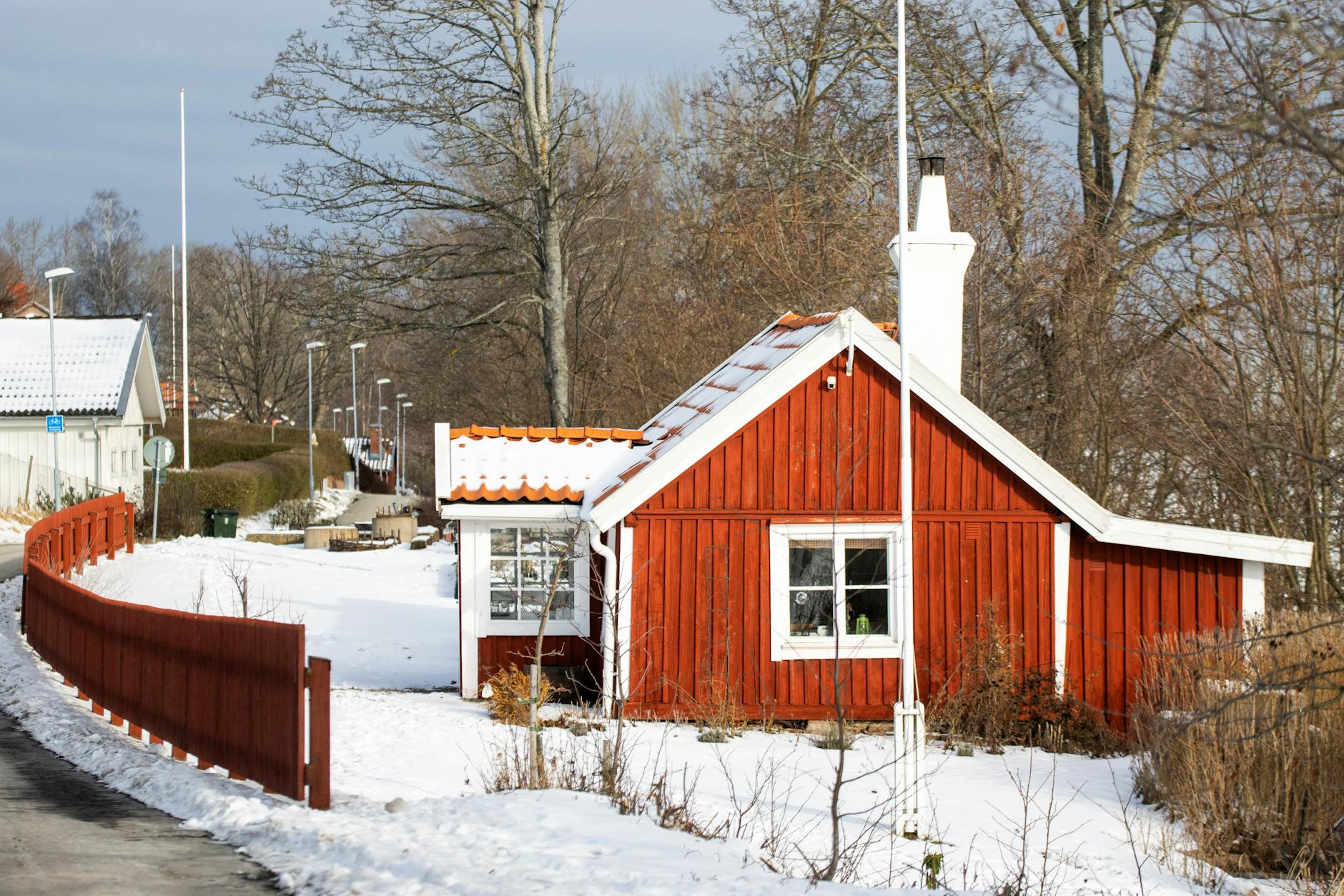 Traditional red Swedish wooden cottage on an archipelago island