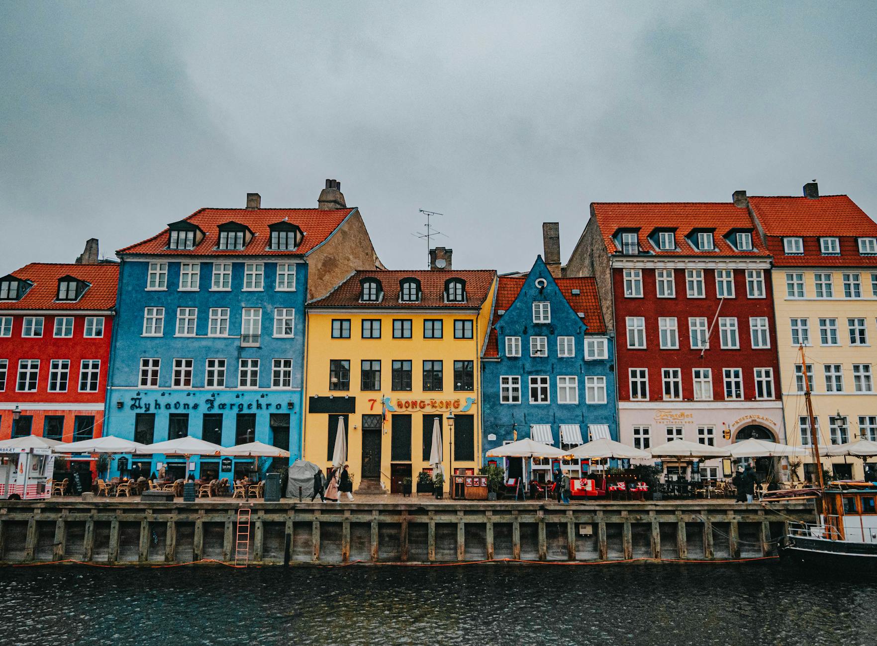 Colorful houses along Nyhavn canal in Copenhagen