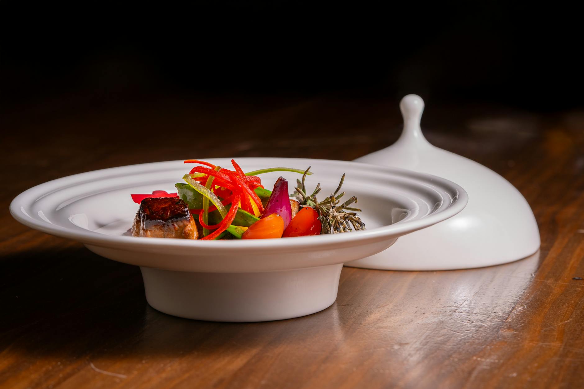 Elegant Michelin-starred tasting menu plate with vegetables