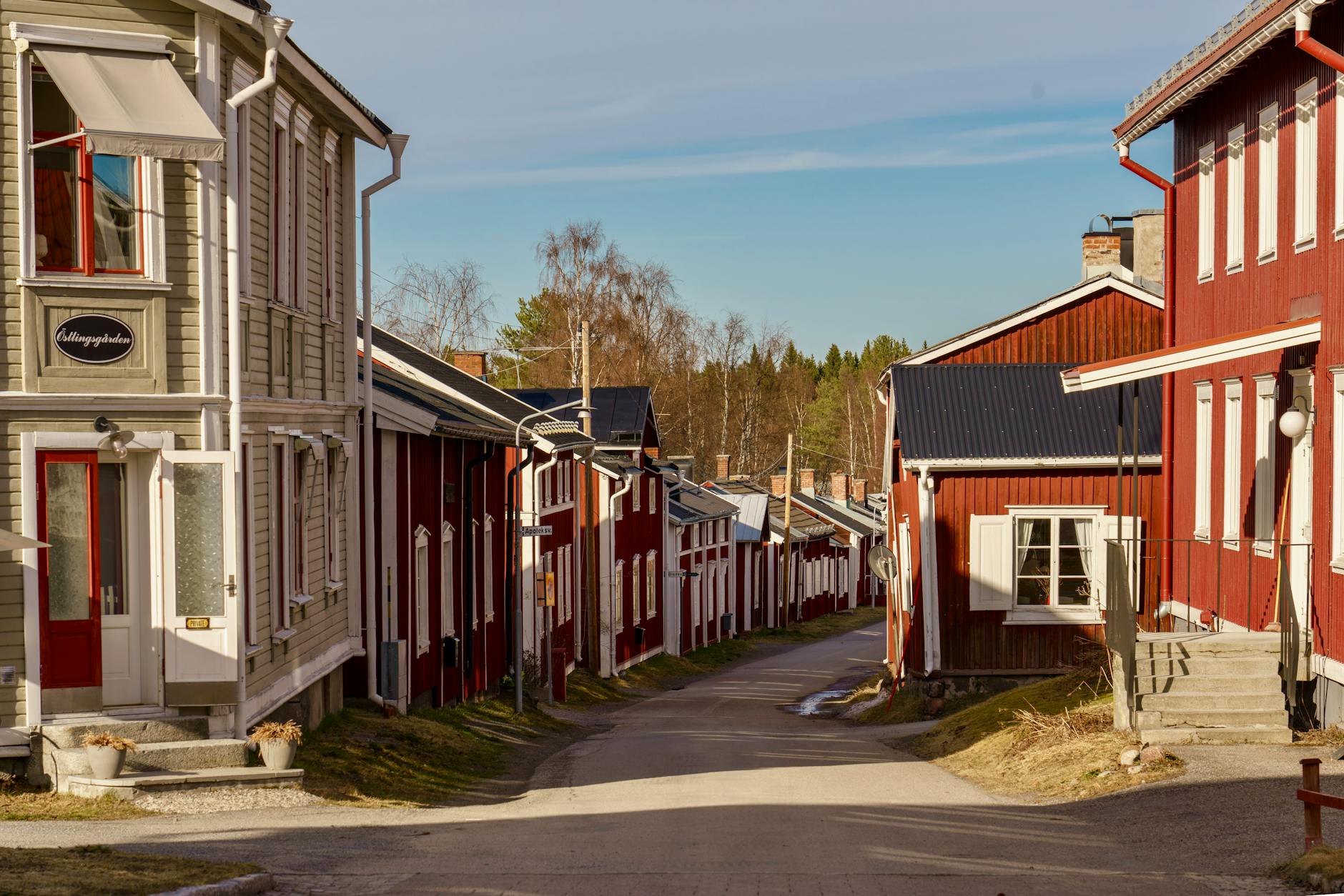 Swedish wooden houses on cobblestone street in old town