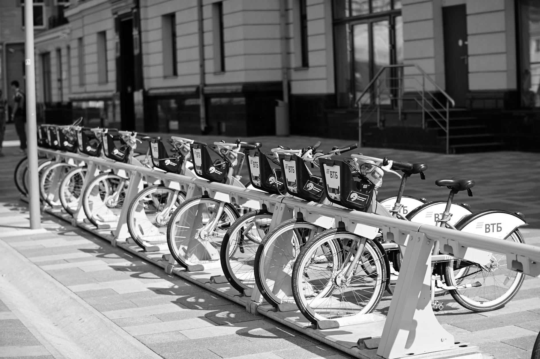 Stockholm bike tours — rental bikes parked at a rack near the water