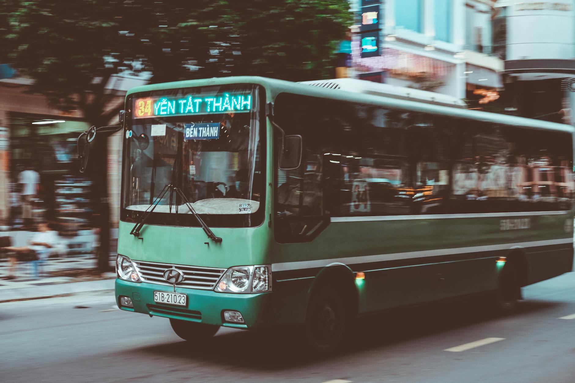 City bus on Stockholm street with commuters