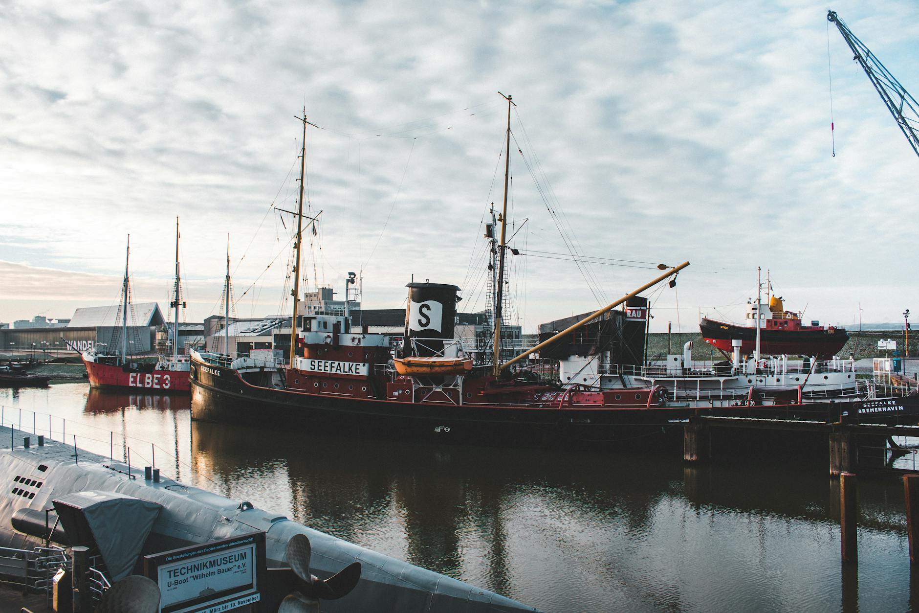 Maritime museum with historic warship indoors