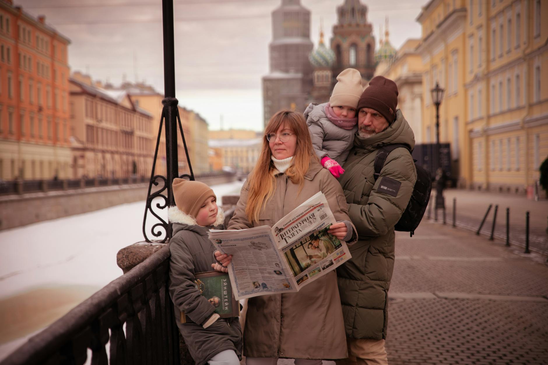 Family with children traveling in a Scandinavian city