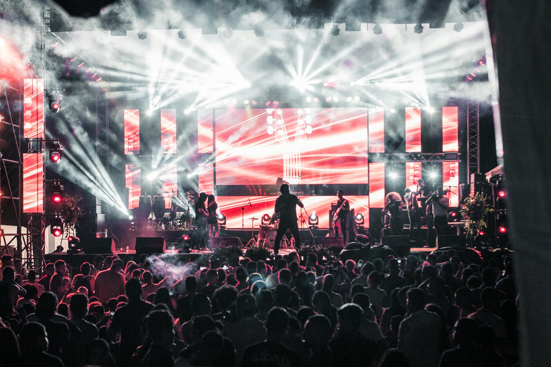 Live music concert with stage lights and audience