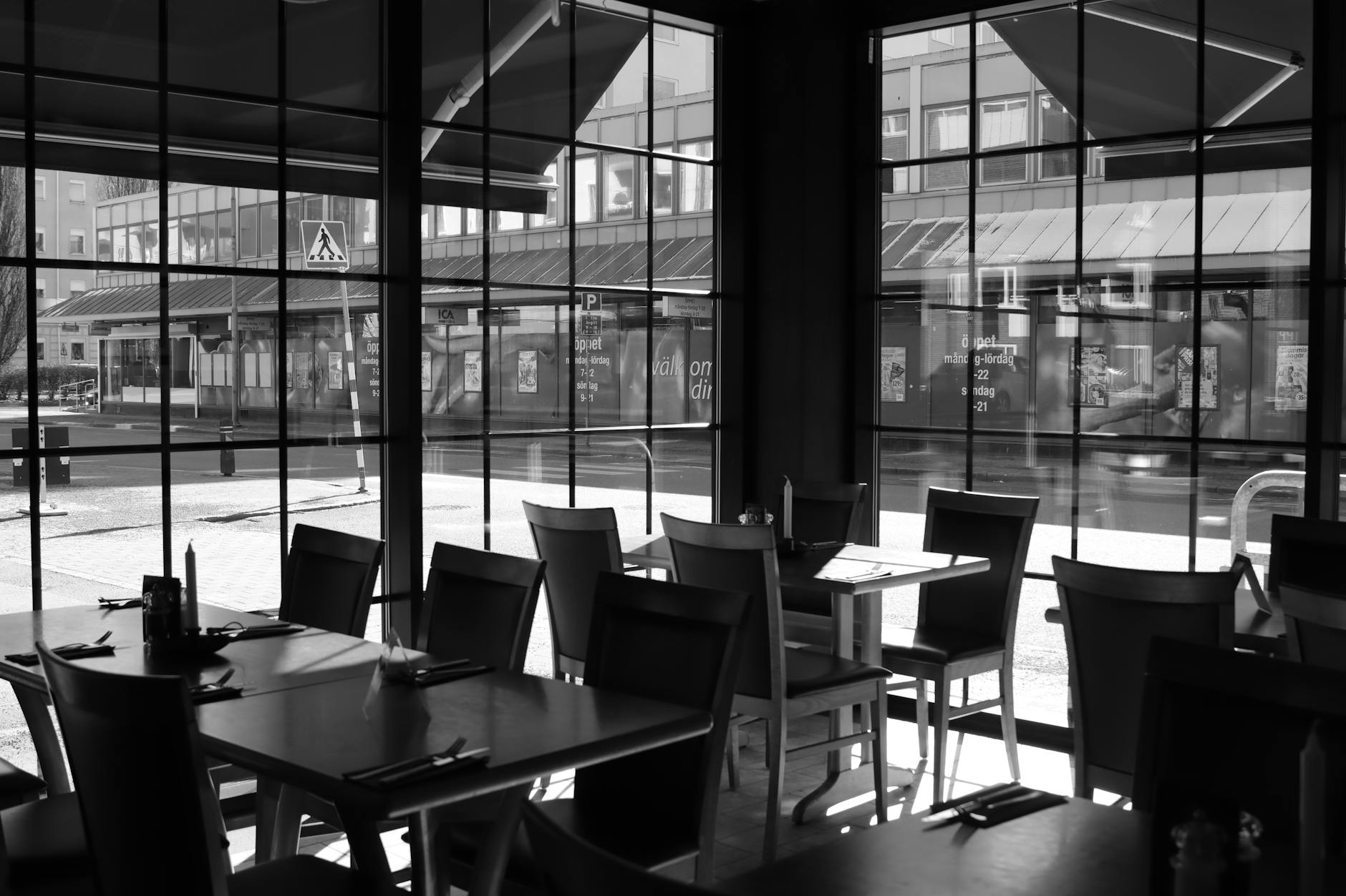 Scandinavian restaurant interior with wood tables and natural light