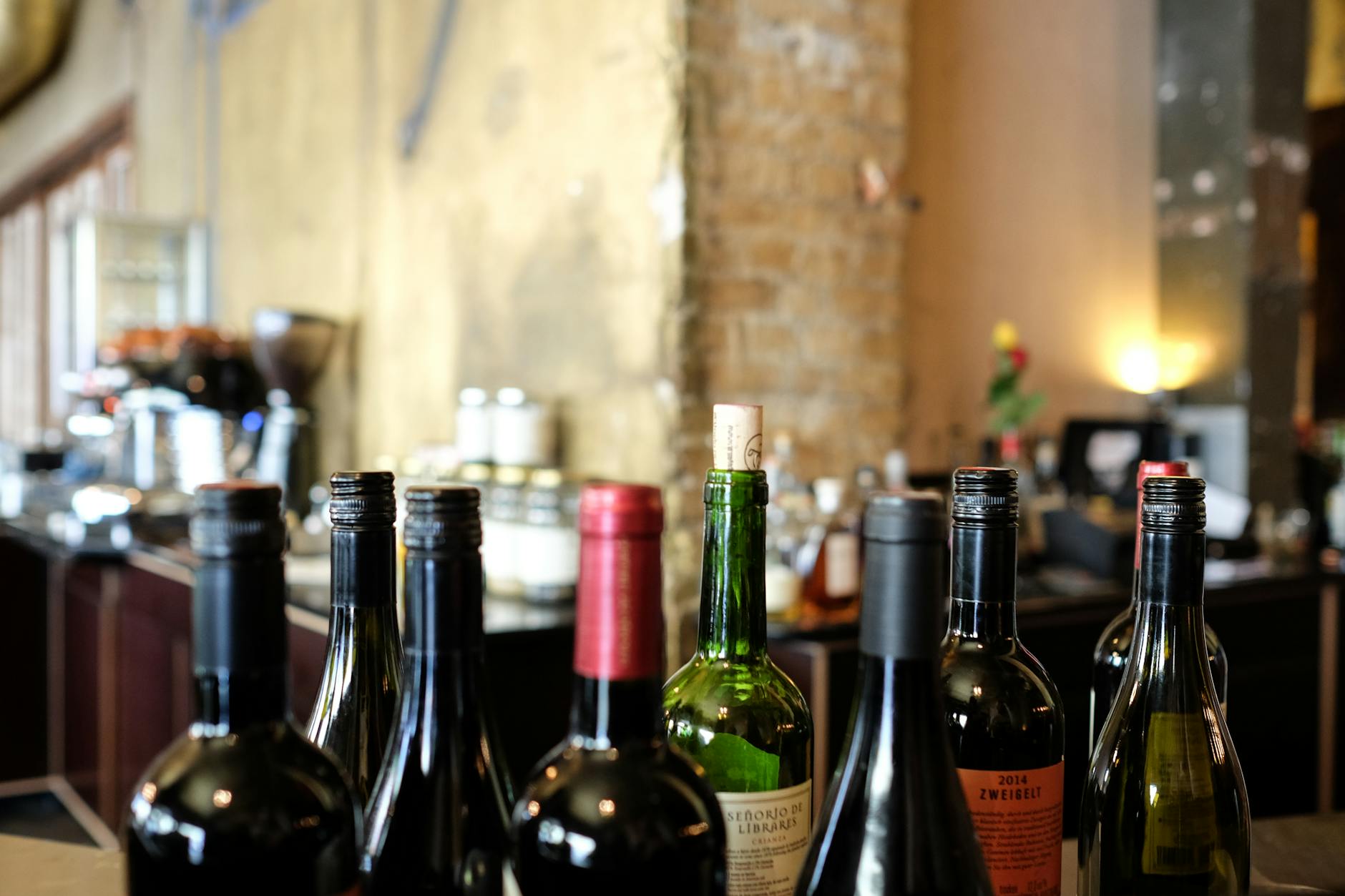 Natural wine bottles and glasses at a Stockholm wine bar