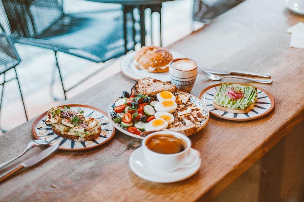 Best brunch Stockholm — a weekend brunch spread of eggs, sourdough toast and coffee