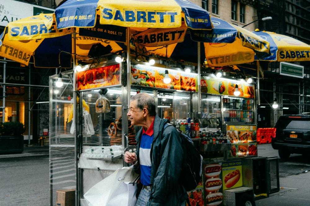 Hot dog stand serving a korv, one of the classic cheap eats in Stockholm from a street korvkiosk