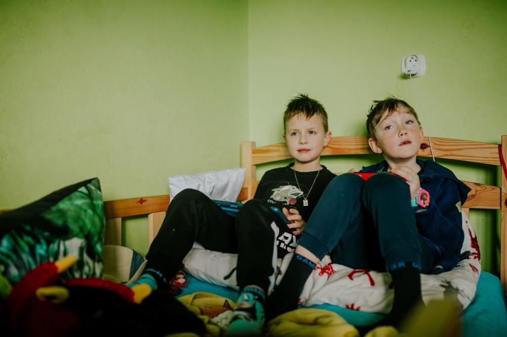 Bright family hotel room with two beds, the kind of setup family hotels Stockholm offer for parents travelling with children