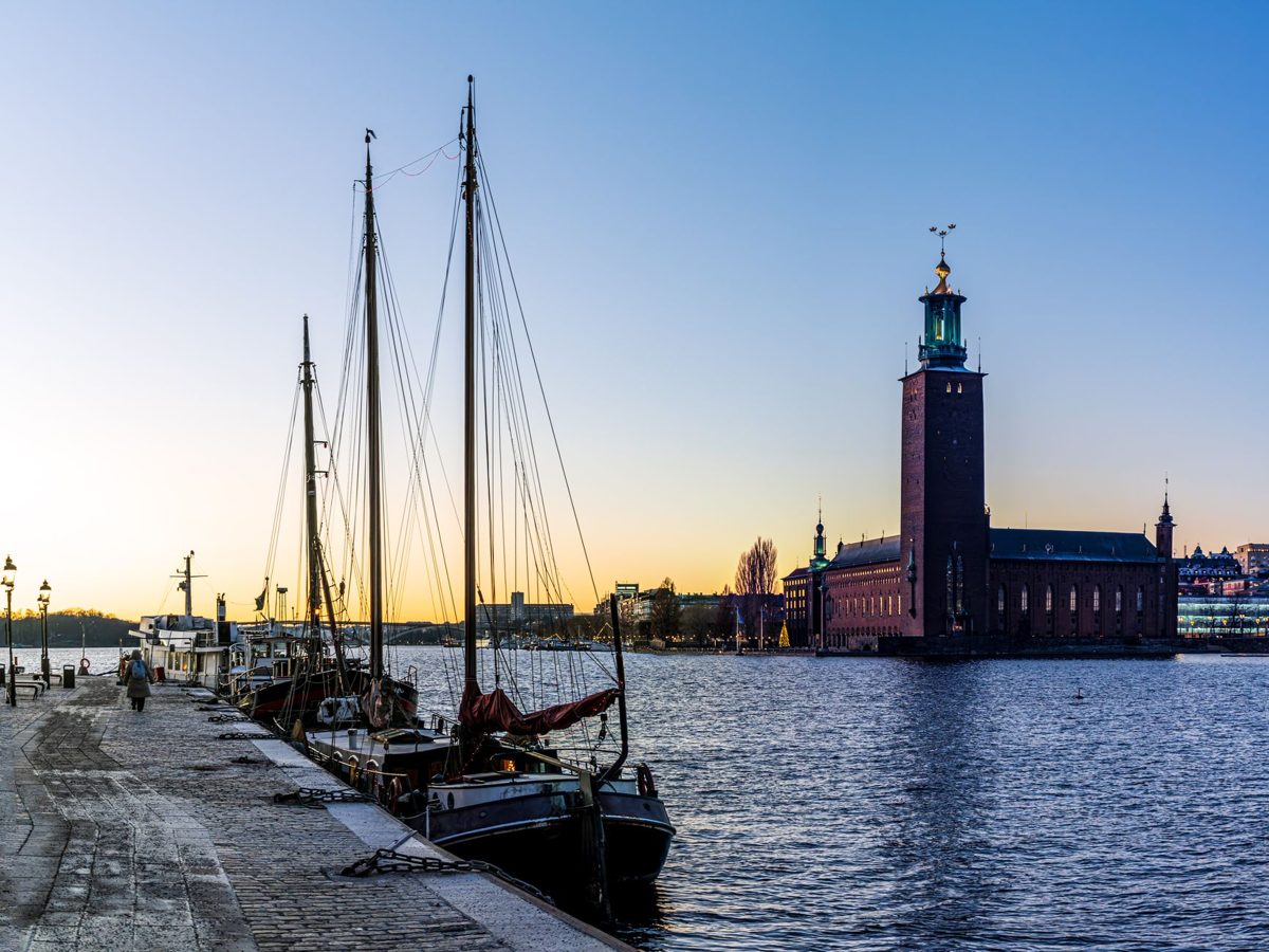 Kungsholmen guide — Stockholm City Hall (Stadshuset) brick tower seen from the water