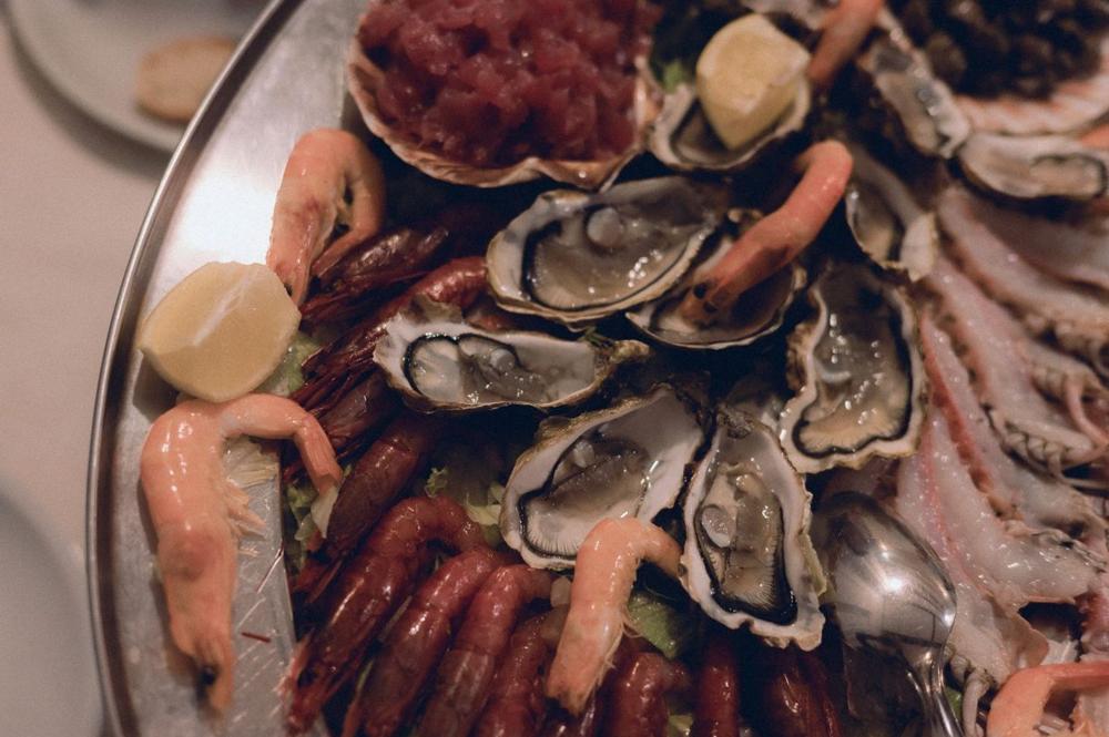 Fresh seafood platter with oysters and shrimp at a Stockholm seafood restaurant