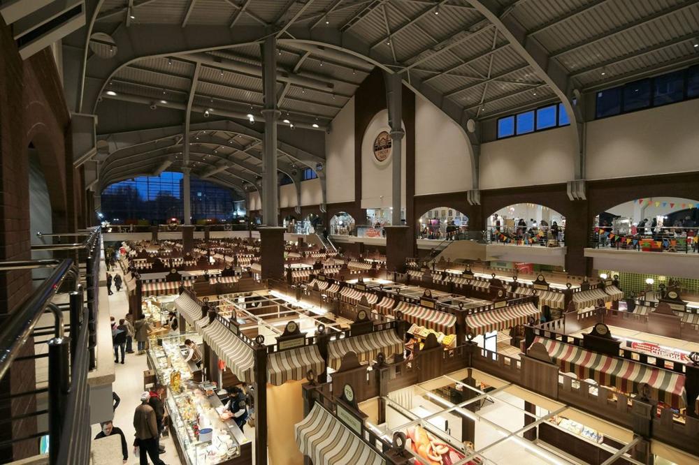 Stockholm food market — stalls and fresh produce inside a saluhall food hall