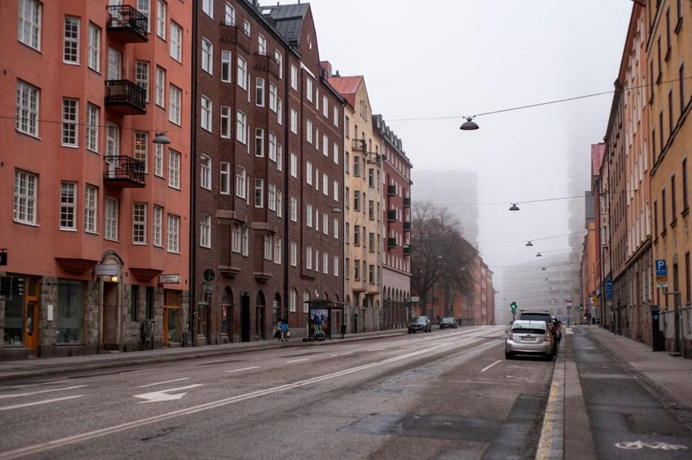 Leafy residential street in Vasastan Stockholm where locals live, walkable and quiet