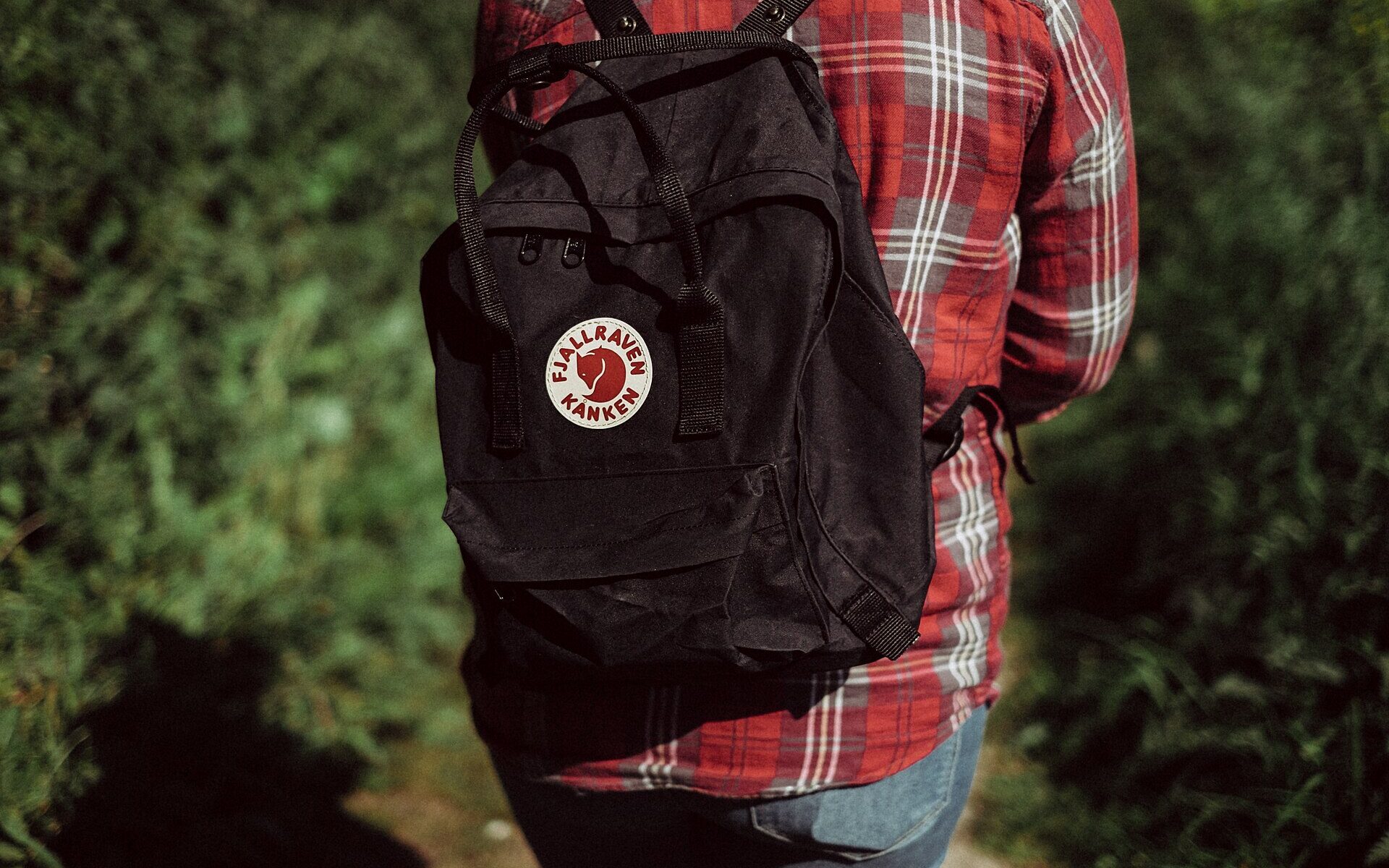 A Fjällräven Kånken rucksack worn on someone's back
