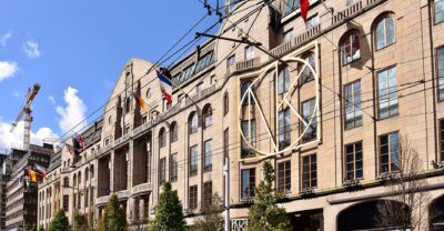 The NK department store on Hamngatan in Stockholm, with its illuminated monogram and rotating rooftop sign