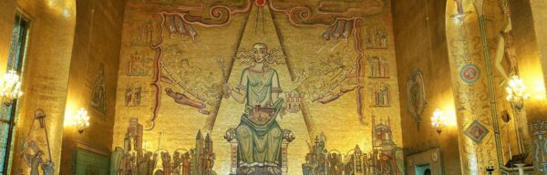 The Golden Hall of Stockholm City Hall, its walls covered in gold mosaic, with the seated Queen of Lake Mälaren on the end wall and a polished stone floor