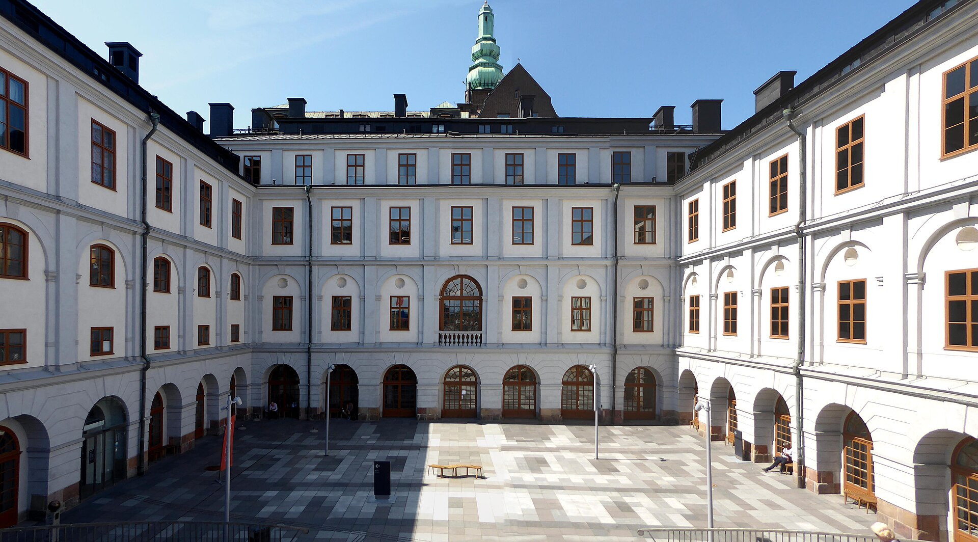 The large cobbled courtyard of the Stockholm City Museum at Slussen, surrounded by the white seventeenth-century palace wings