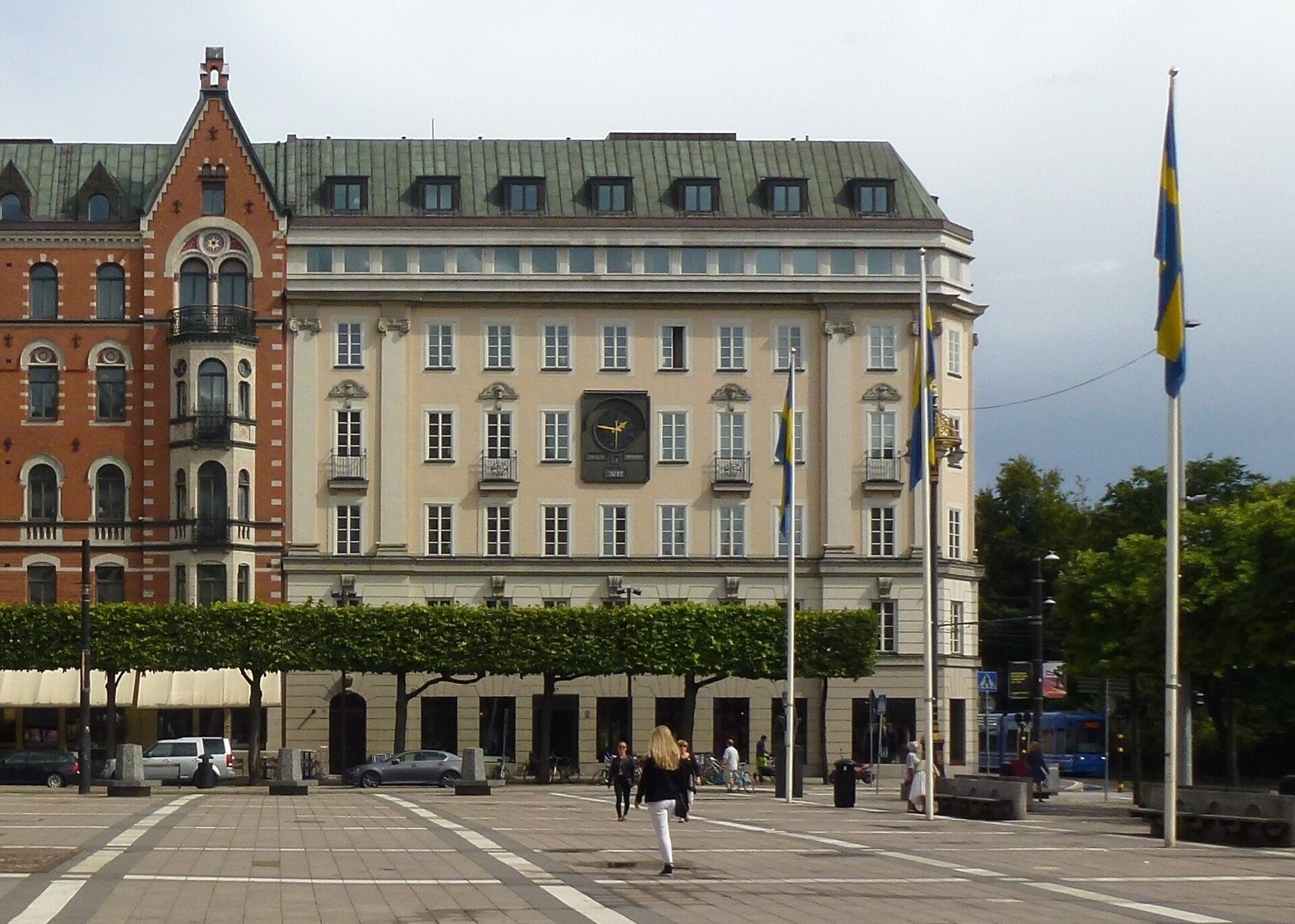 The former Kreditbanken building on Norrmalmstorg in Stockholm, with its clock and arcaded ground floor