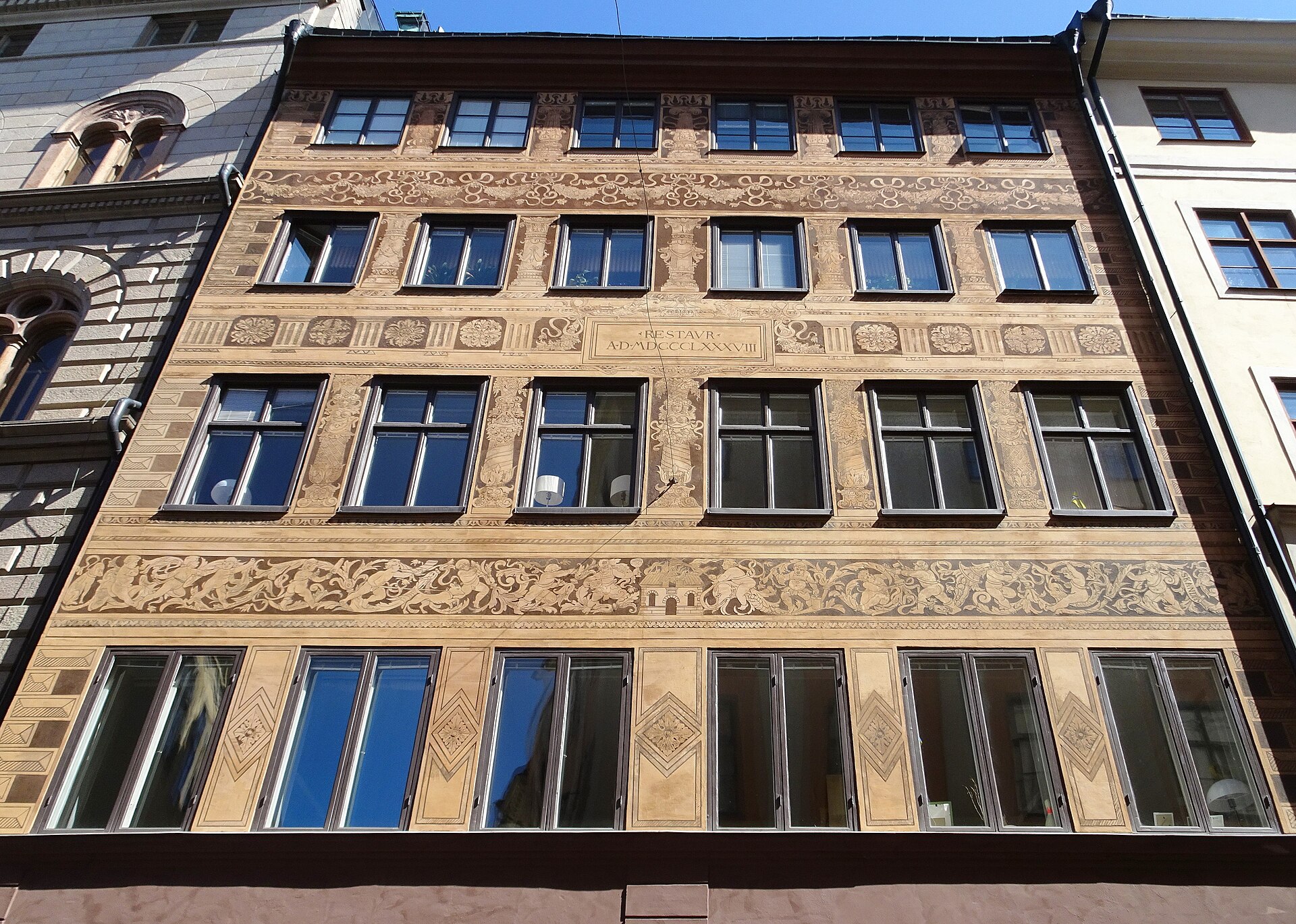 An ornately decorated sgraffito façade on Västerlånggatan in Stockholm's old town